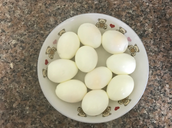Wash the eggs with clean water until they are cool, and then peel them for standby