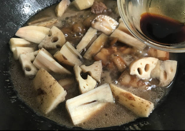 Add lotus root, light soy sauce, and white sugar
